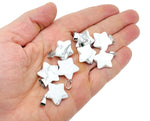 Howlite star-shaped pendant from GemstoneGO, a crystal jewelry making supply with a smooth, polished white stone design.