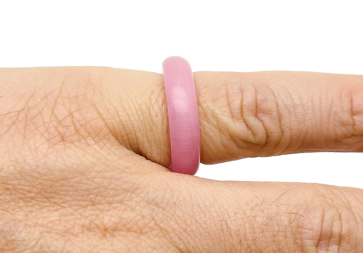 Pink Cats Eye Crystal Ring by GemstoneGO featuring a vibrant pink cat's eye gemstone set in a stylish jewelry ring