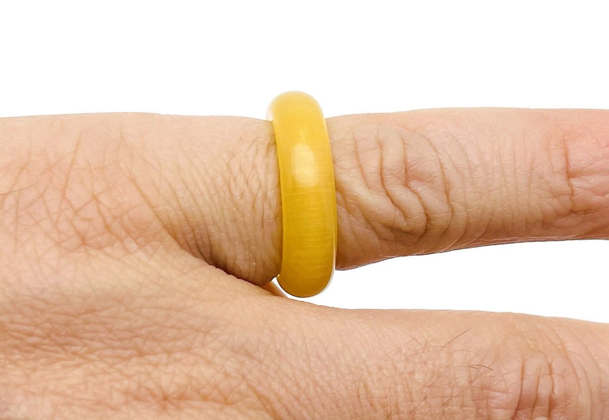 Yellow cats eye crystal ring by GemstoneGO featuring a vibrant, polished gemstone set in a sleek metal band.
