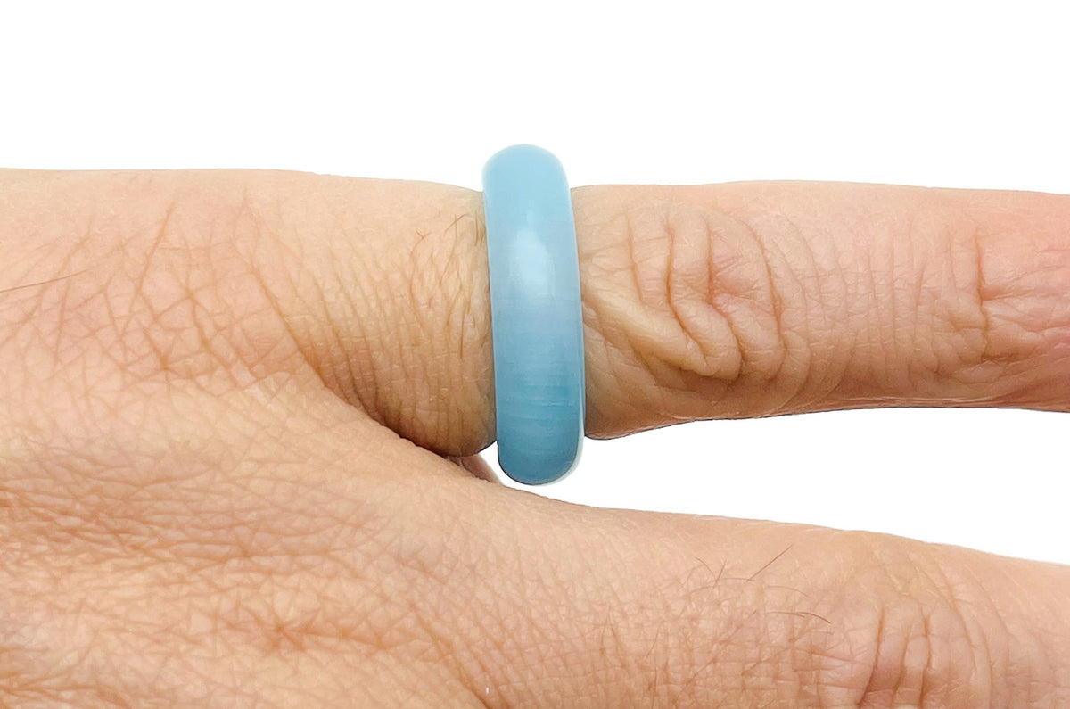 Blue Cats Eye crystal ring from GemstoneGO featuring a vibrant blue oval gemstone set in a silver band.