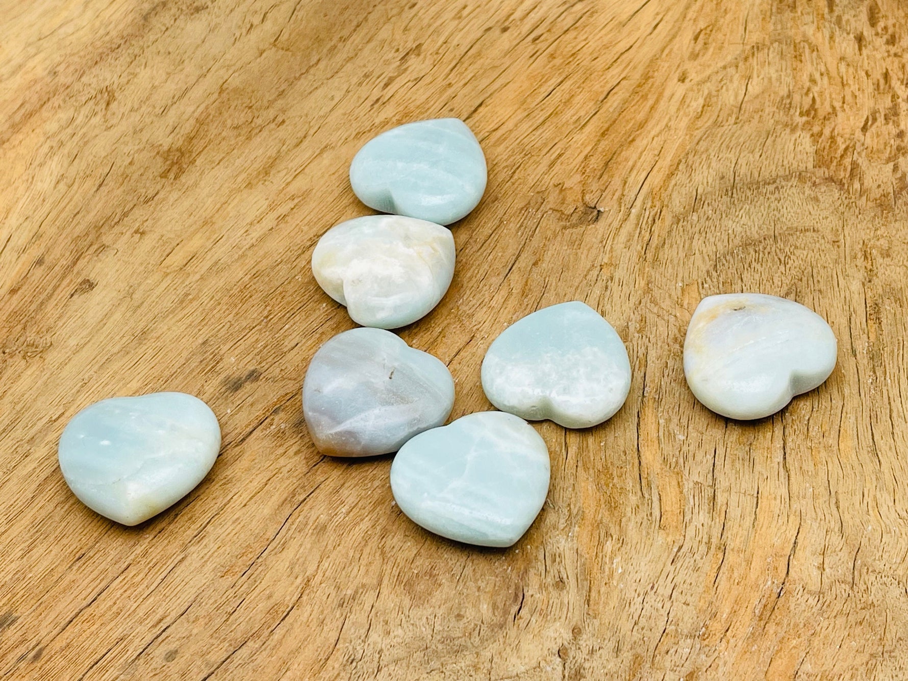 Amazonite heart-shaped gemstone pendant, 30mm, from GemstoneGO showcasing vibrant blue-green mineral with natural patterns.