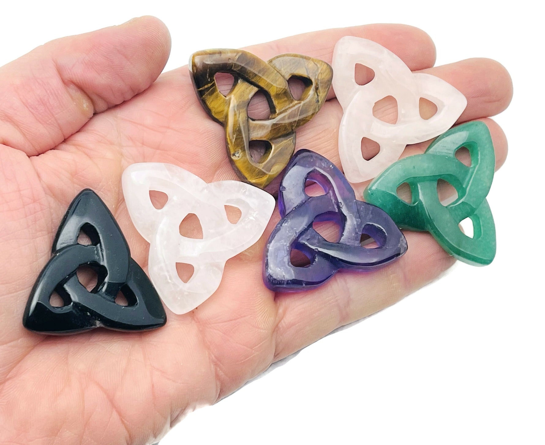 Crystal Celtic Knot carved gemstone pendant featuring Trinity design, available in various stones, from GemstoneGO.