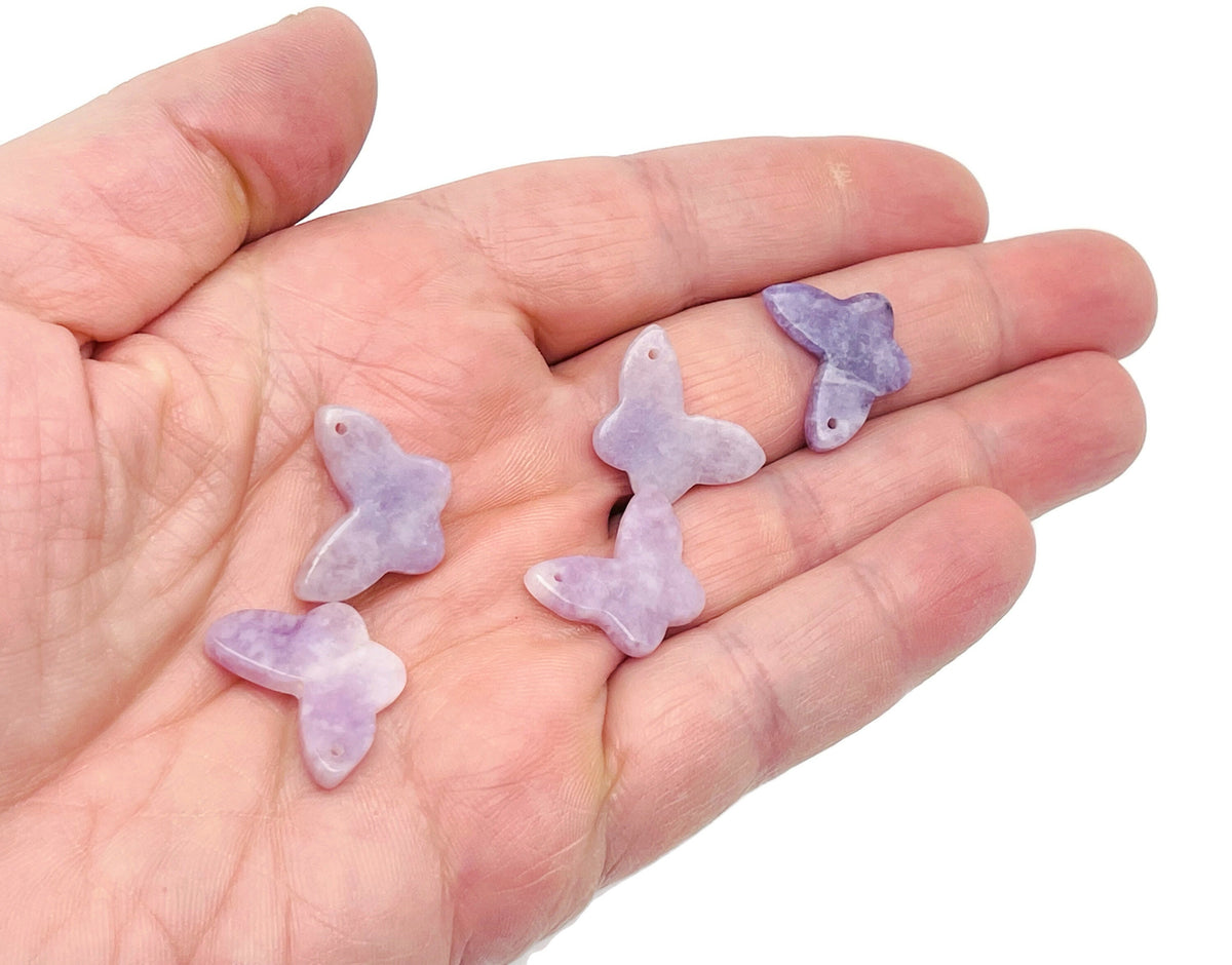 Lepidolite mini butterfly gemstone pendant with hole for jewelry, showcasing purple and pink hues, by GemstoneGO.