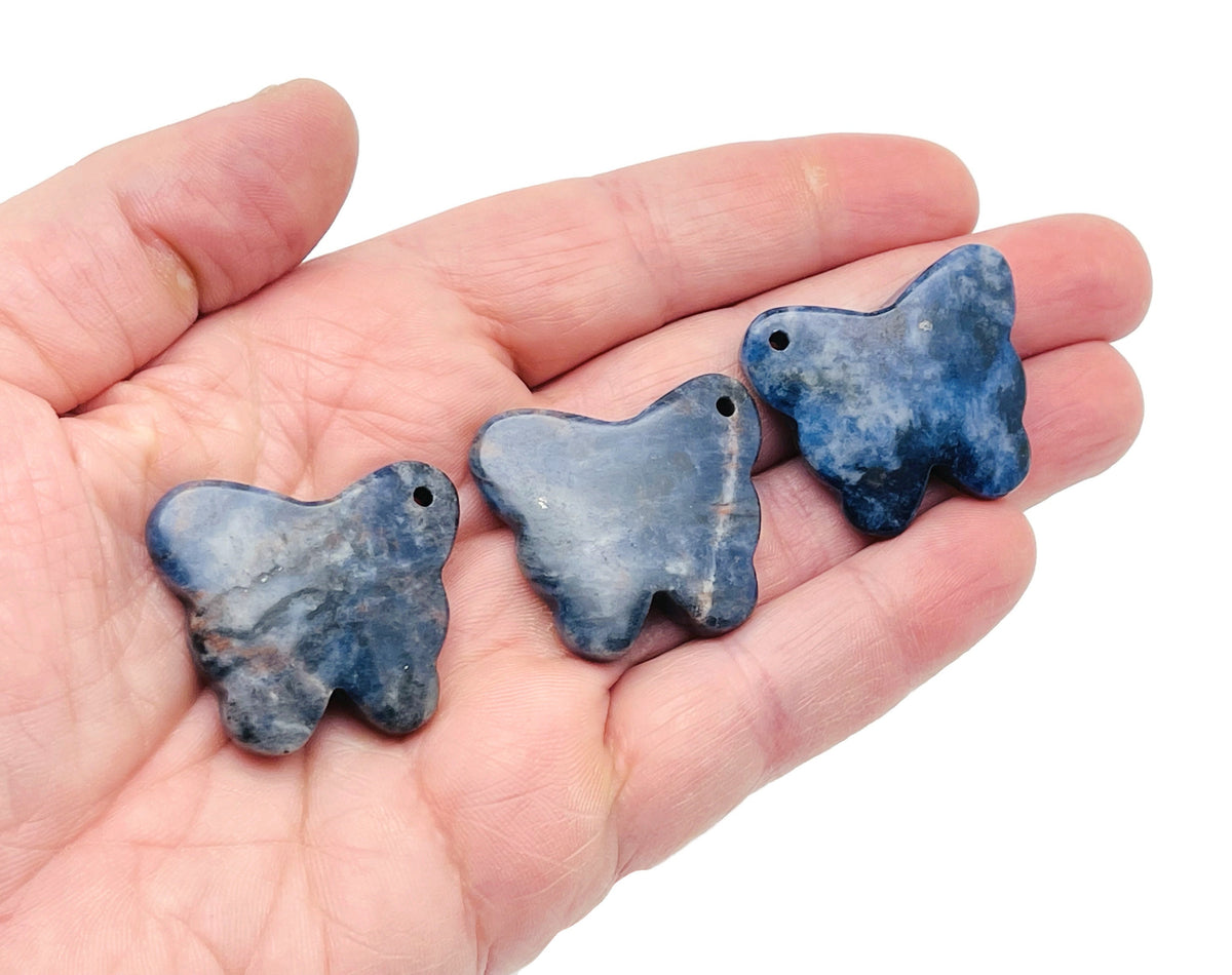 Sodalite butterfly gemstone pendant with hole crystal jewelry, featuring vibrant blue and white patterns, from GemstoneGO.