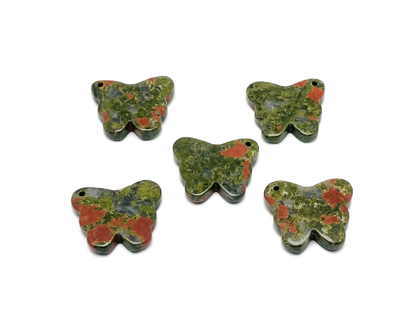 Unakite butterfly gemstone pendant with a hole for jewelry, showcasing vibrant green and pink natural stone details.