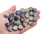 Set of 25 amethyst crystal rune stones engraved with Elder Futhark alphabet, part of GemstoneGO's crystal rune kit.