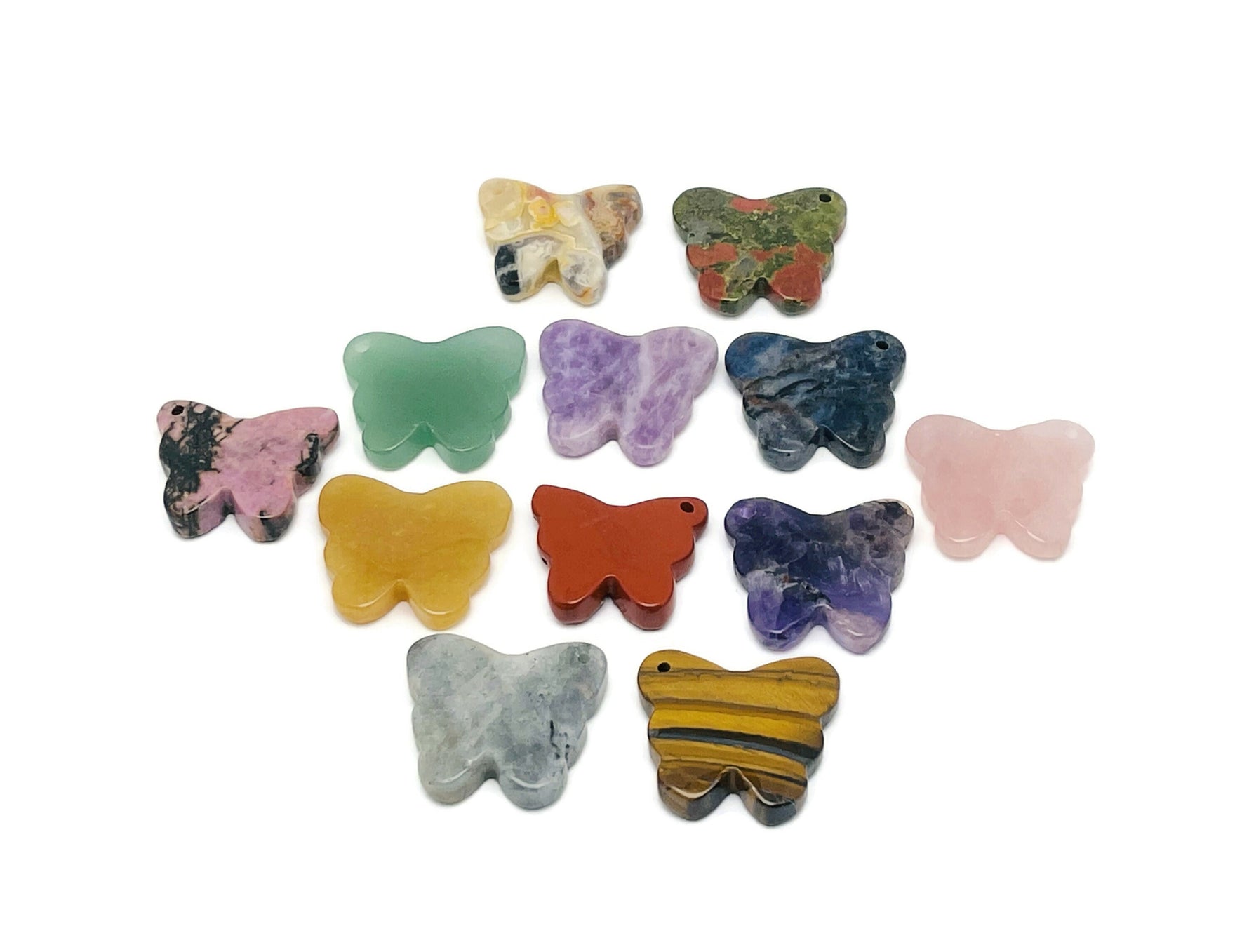 Carved butterfly gemstone pendant with hole for jewelry, colorful crystal loose stone from GemstoneGO, natural gemstone jewelry accessory.