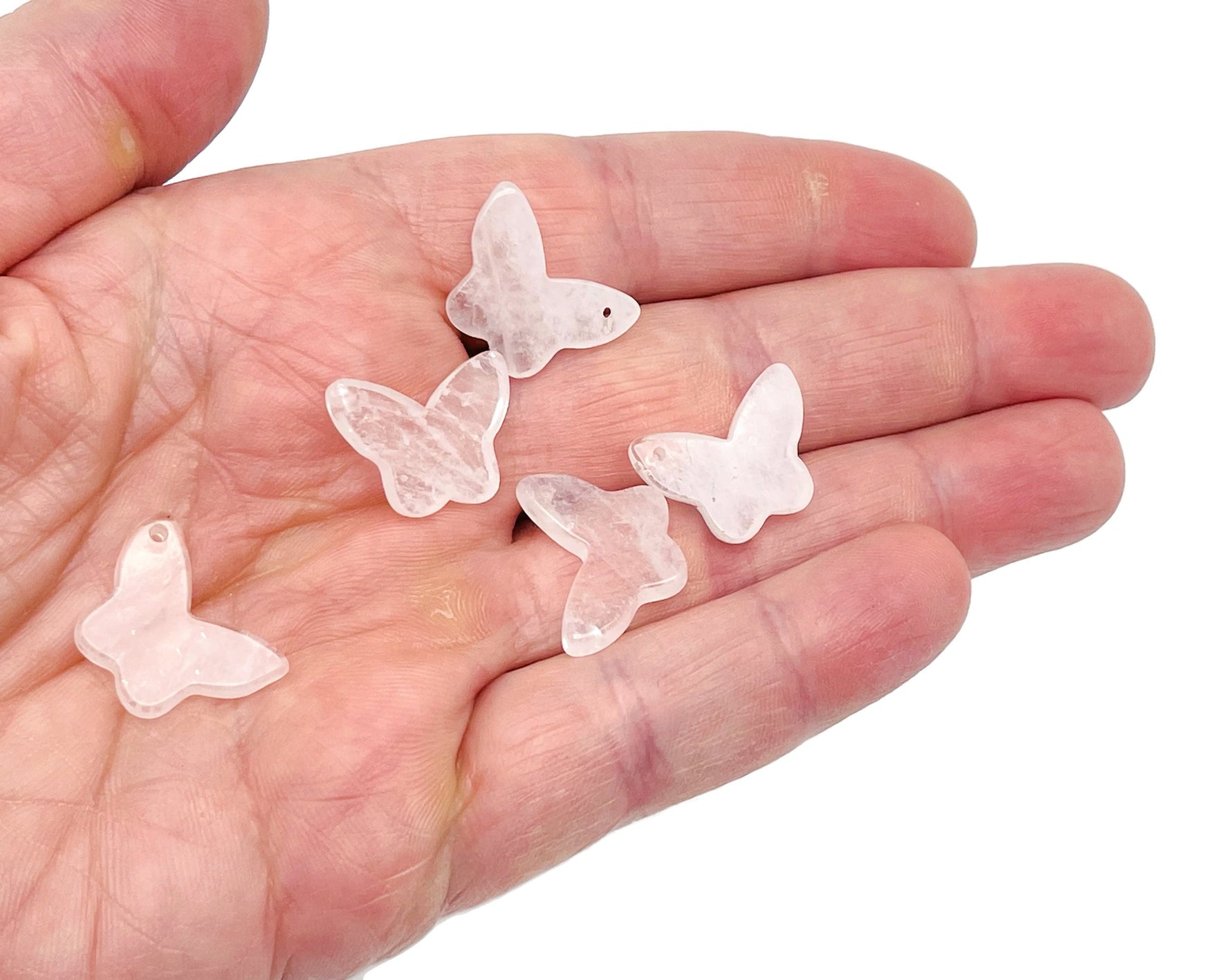 Clear quartz mini butterfly gemstone pendant with hole, featuring delicate butterfly shape, gemstone jewelry by GemstoneGO.