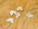 Clear quartz mini butterfly gemstone pendant showing a delicate butterfly shape with a hole for jewelry, from GemstoneGO.