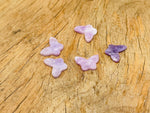 Lepidolite mini butterfly gemstone pendant from GemstoneGO, featuring a hole drilled crystal jewelry piece on a white background.