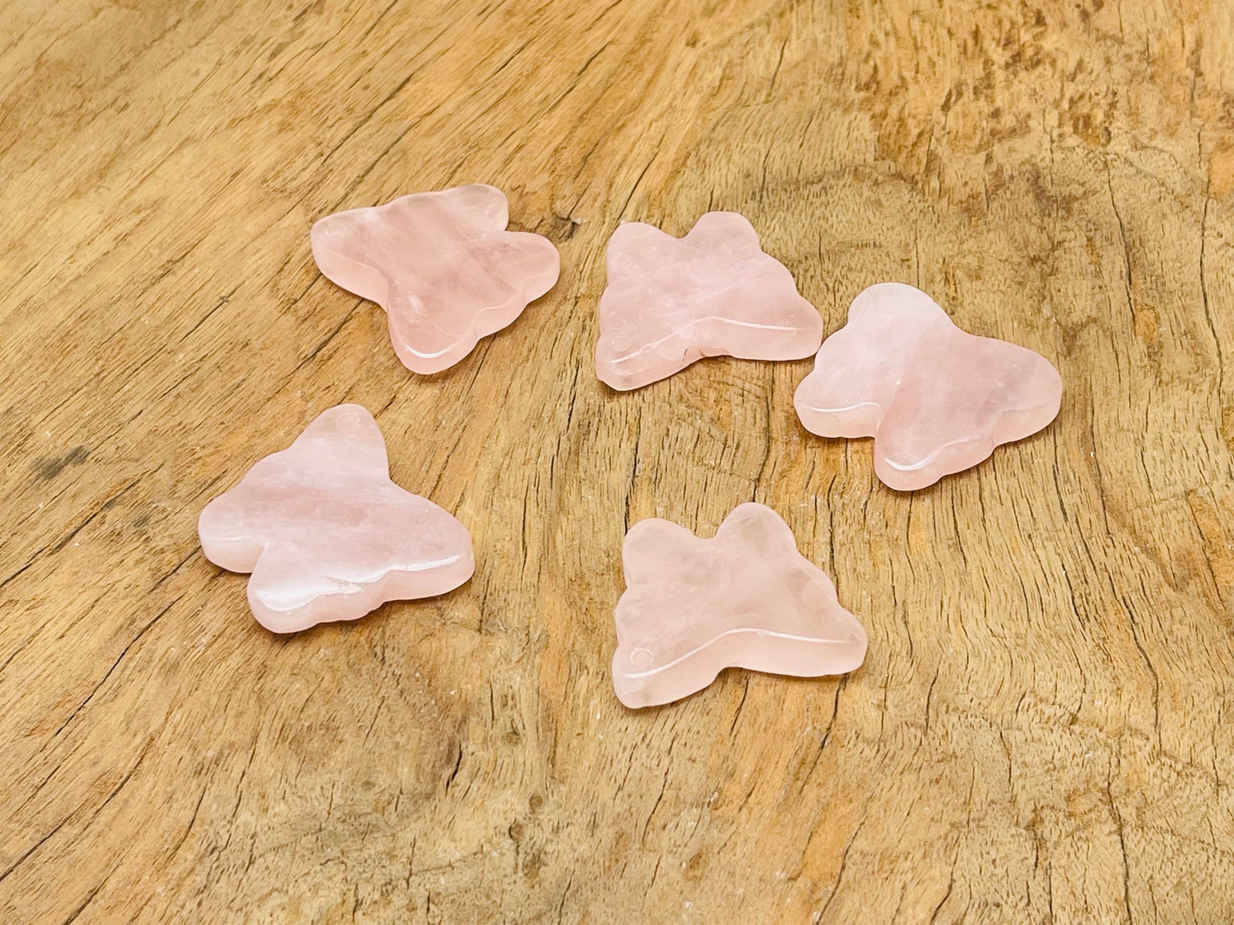 Rose quartz butterfly gemstone pendant with hole crystal jewelry, featuring a delicate pink stone and butterfly shape from GemstoneGO.