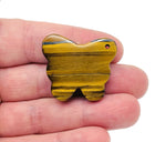 Tiger Eye butterfly gemstone pendant with hole, crystal jewelry piece featuring warm brown and gold tones, by GemstoneGO.