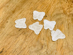 Clear Quartz butterfly gemstone pendant with drilled hole, showcasing a transparent crystal design, jewelry piece from GemstoneGO.