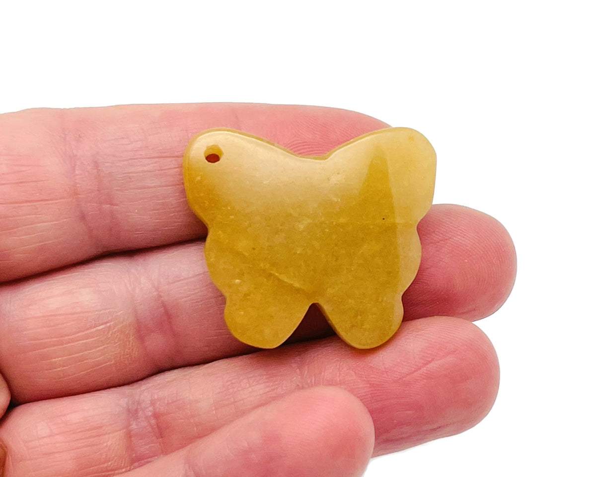 Yellow jade butterfly gemstone pendant with hole crystal jewelry, featuring a vibrant yellow jade butterfly design.