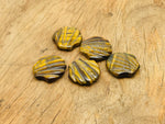 Tiger Eye sea shell carving gemstone, 30mm, showcasing intricate natural patterns and warm earthy tones.