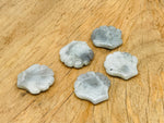 Labradorite sea shell carving gemstone from GemstoneGO, 30mm, showcasing iridescent labradorite with shell pattern details.