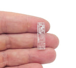 Clear quartz crystal pendant from GemstoneGO, drilled for jewelry making, showcasing a transparent, polished gemstone.