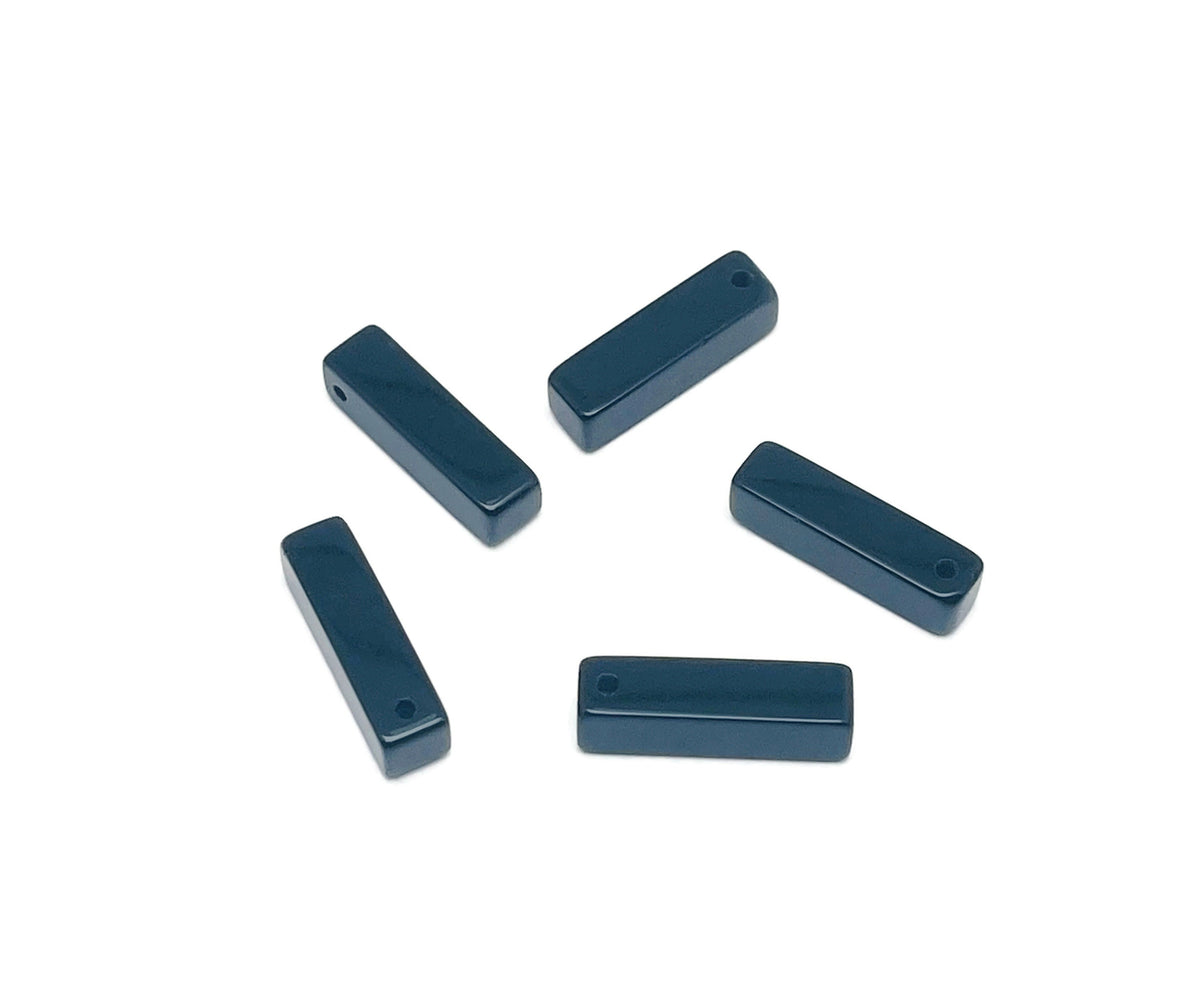 Drilled obsidian crystal pendant from GemstoneGO, showcasing a smooth, polished black gemstone for jewelry making.