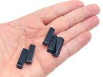 Drilled obsidian crystal pendant from GemstoneGO, showcasing a smooth, polished black stone ready for jewelry making.