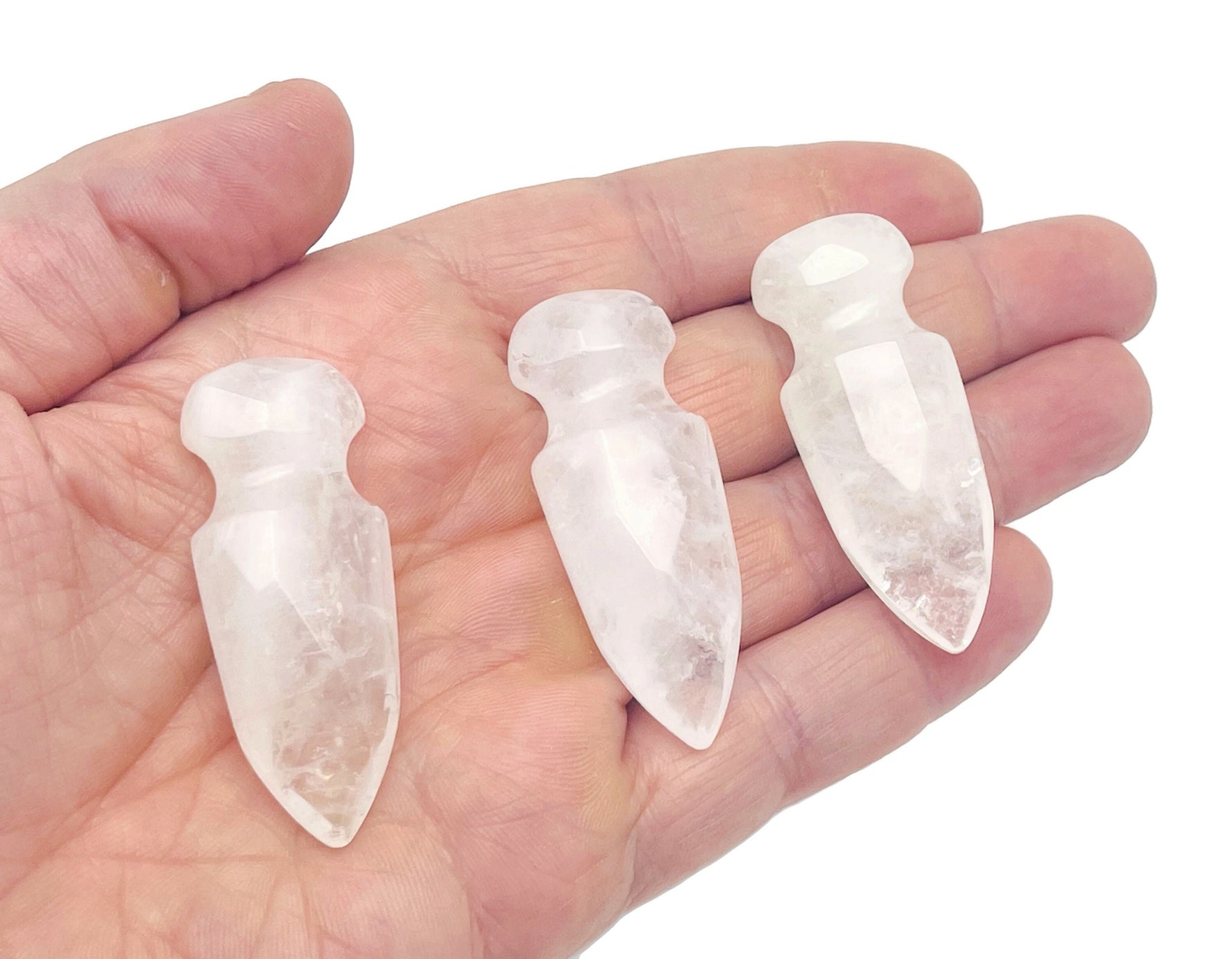 Clear quartz sword dagger carved gemstone from GemstoneGO, 50mm length with detailed carving and polished surface.