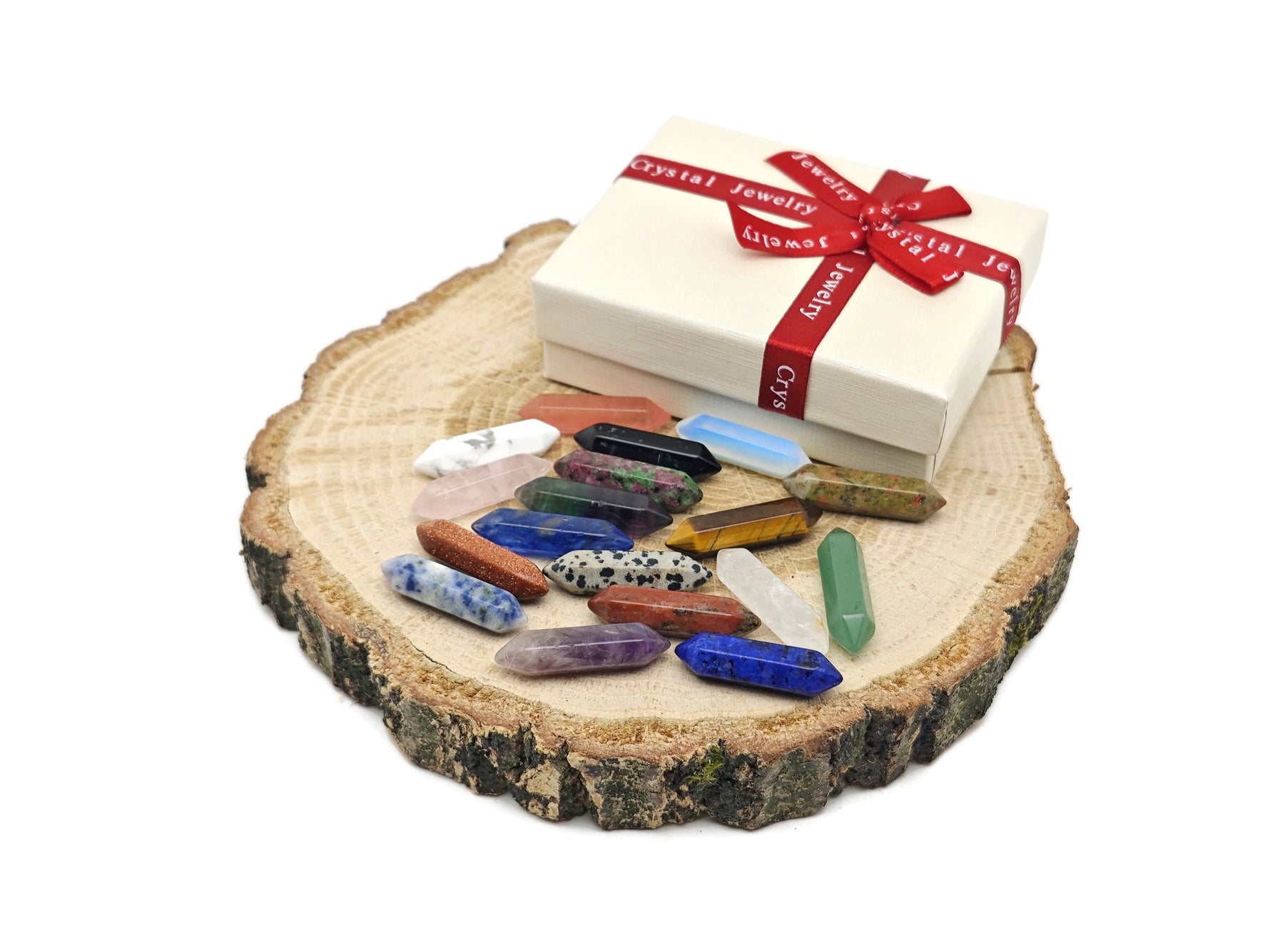 Set of 10 energy crystals from GemstoneGO's Crystal Mystery Box Gift with carved terminated points and natural gemstone variety.
