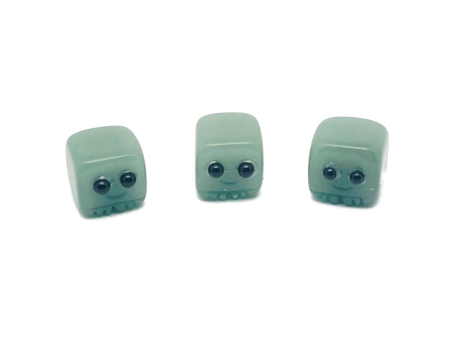 Handmade aventurine gemstone carving of a skull, detailed crystal sculpture, perfect as a gift for kids, by GemstoneGO.