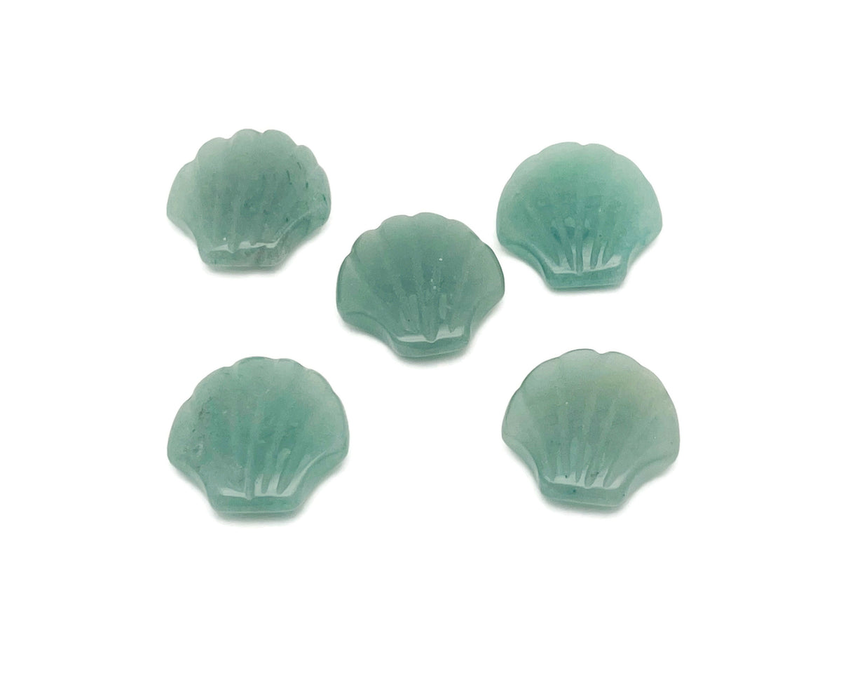 A 30mm aventurine sea shell carving gemstone from GemstoneGO showing intricate carved sea shell design on smooth green stone.