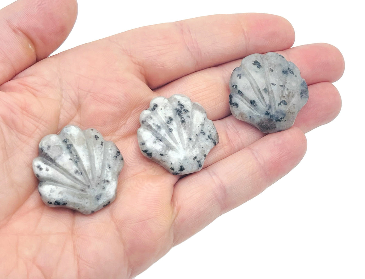 Kiwi Jasper sea shell carving gemstone 30mm from GemstoneGO, showcasing intricate shell design and vibrant natural colors.