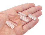 Clear quartz crystal pendant from GemstoneGO, drilled gemstone for jewelry making, showcasing a polished, transparent quartz stone.