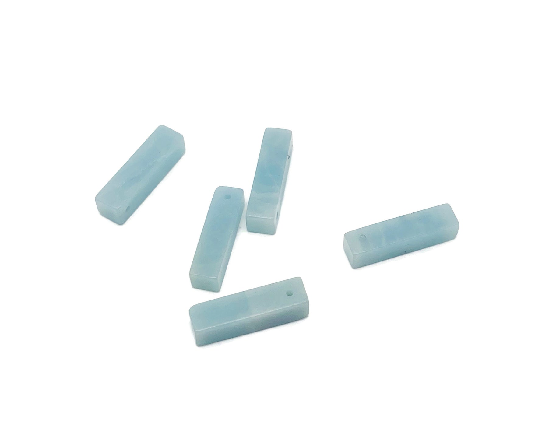 Amazonite crystal pendant from GemstoneGO, drilled gemstone for jewelry making, showcasing vibrant blue-green mineral with polished surface.