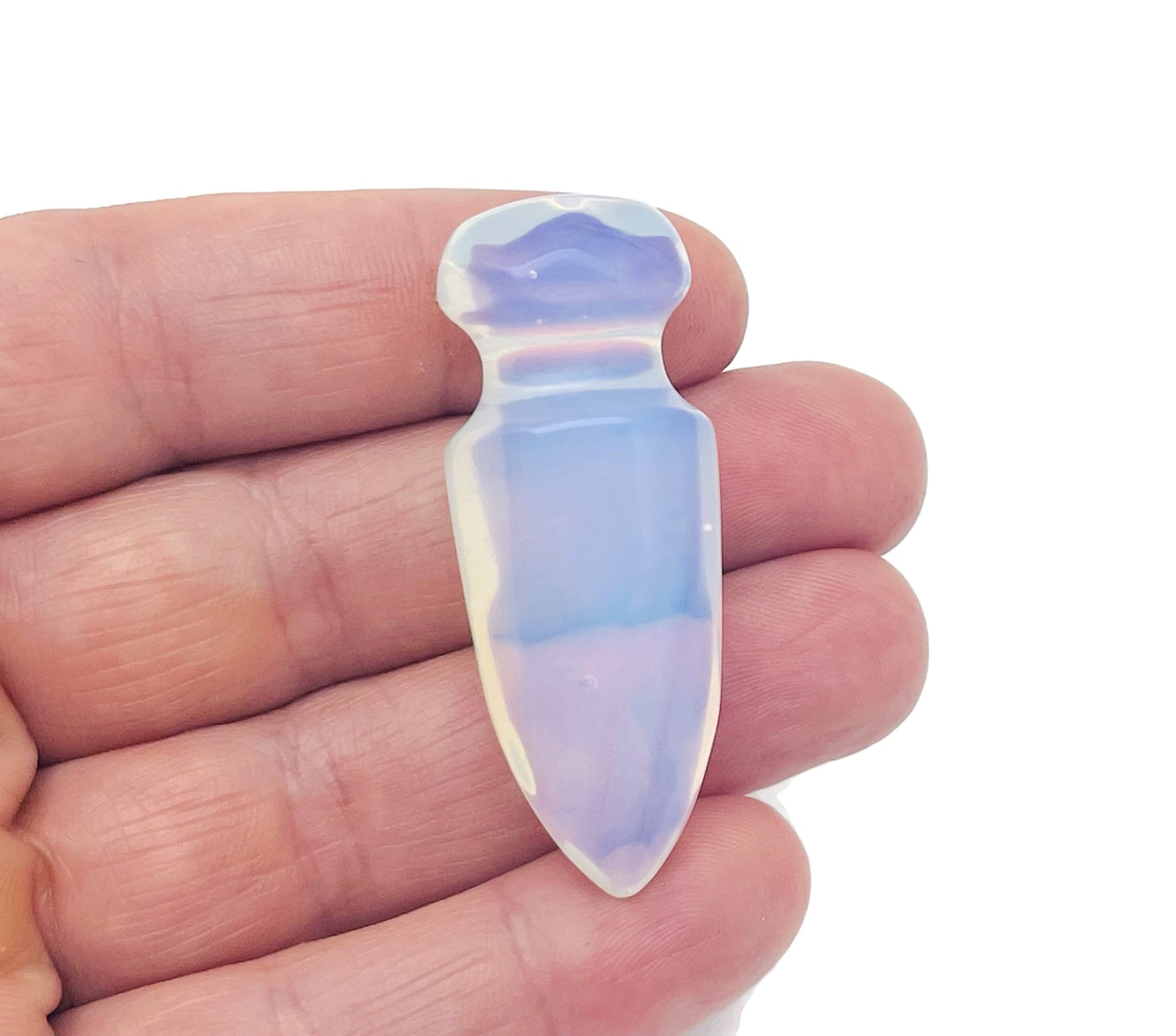 Opalite gemstone dagger with carved sword design, 50mm size, showcasing intricate details and a smooth polished finish.