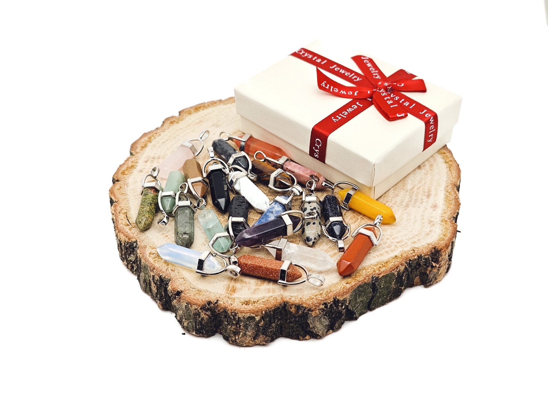 Set of 10 gemstone point pendants with carved crystal shapes from GemstoneGO Crystal Mystery Box Gift Kit, showcasing varied colorful stones.