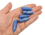 Polished blue aventurine bullet gemstone pendant with carved details, showcasing smooth, vibrant blue stone on a neutral background.