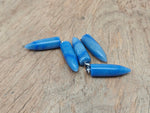 Blue aventurine bullet gemstone pendant with polished carved design, featuring a smooth, rounded shape and natural gemstone texture.