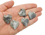 Labradorite wolf head gemstone pendant from GemstoneGO featuring a polished crystal jewelry piece with detailed wolf design.
