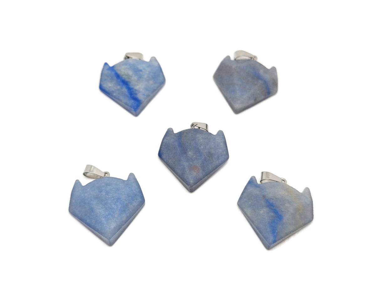 Blue aventurine gemstone wolf head pendant, crystal jewelry featuring intricate wolf design on a polished blue stone.