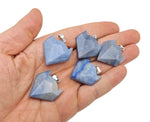 Blue aventurine wolf head gemstone pendant, crystal jewelry piece with detailed wolf design, from GemstoneGO.