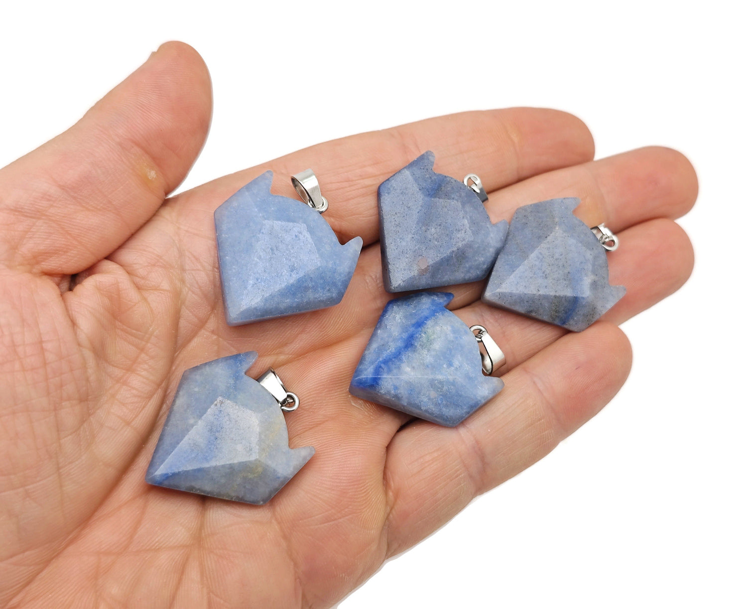 Blue aventurine wolf head gemstone pendant, crystal jewelry piece with detailed wolf design, from GemstoneGO.