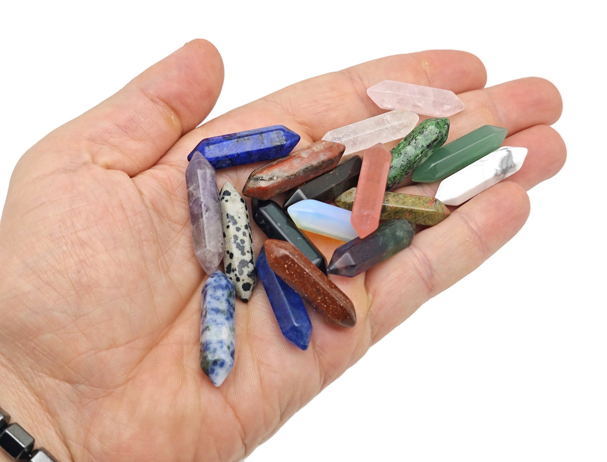 Set of 10 random energy crystals from GemstoneGO's Crystal Mystery Box Gift, featuring terminated point carvings and natural gemstone varieties.