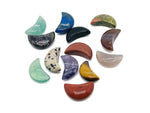 Set of 10 gemstone crystals from GemstoneGO's Crystal Mystery Box featuring moon carvings and various healing stones.