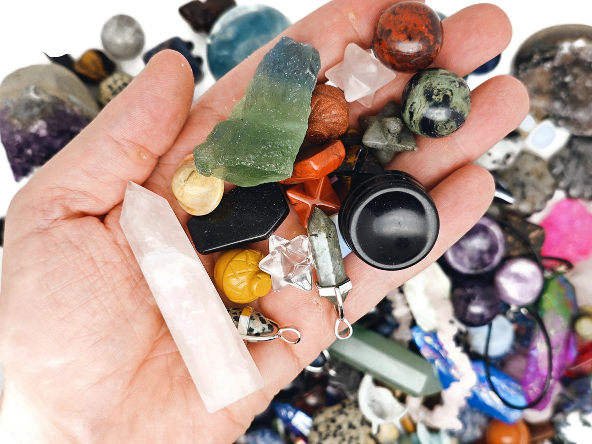 Crystal Mystery Box Gift by GemstoneGO featuring a crystal confetti scoop and healing crystals in a colorful crystal kit.