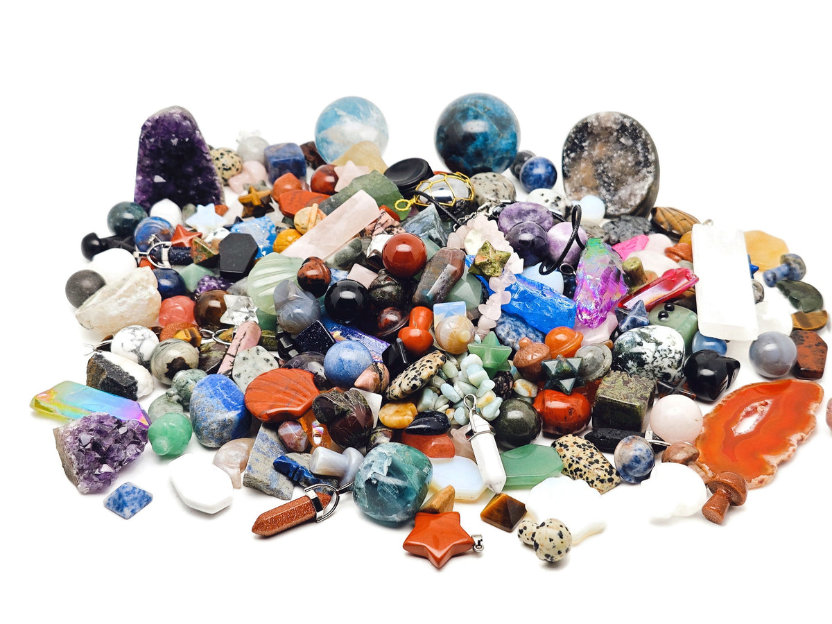 Crystal Mystery Box Gift featuring a crystal confetti scoop, gemstone healing crystals, and a crystal kit from GemstoneGO.