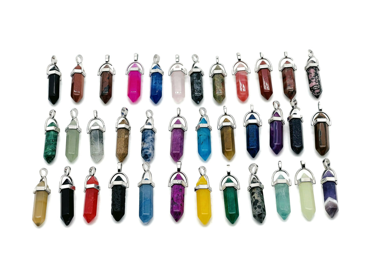Set of 10 gemstone point pendants with carved crystal designs from GemstoneGO Crystal Mystery Box Gift Kit, featuring assorted colorful gemstones.