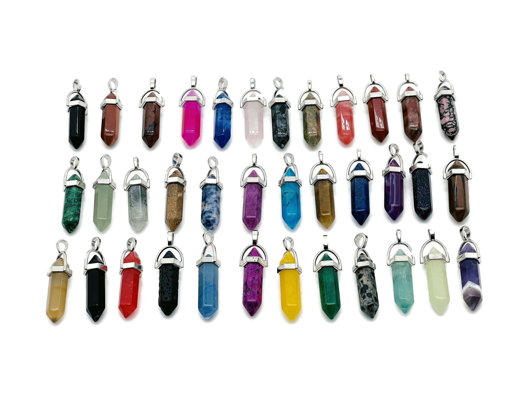 Set of 10 gemstone point pendants with carved crystal designs from GemstoneGO Crystal Mystery Box Gift Kit, featuring assorted colorful gemstones.
