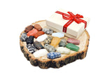 10-piece gemstone mystery box gift set featuring carved coffin-shaped crystals for healing and display by GemstoneGO.