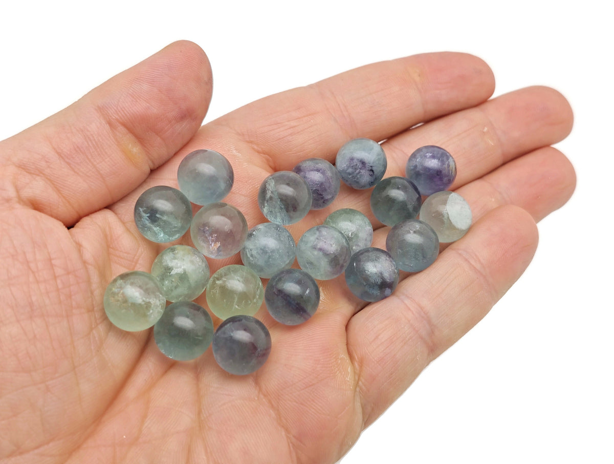 12mm mixed gemstone crystal sphere from GemstoneGO, showcasing vibrant, polished natural gemstone balls for decorative or spiritual use.