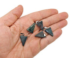 Triangle-shaped crystal pendant from GemstoneGO, ideal for jewelry making, shown in a close-up view of the faceted gemstone.
