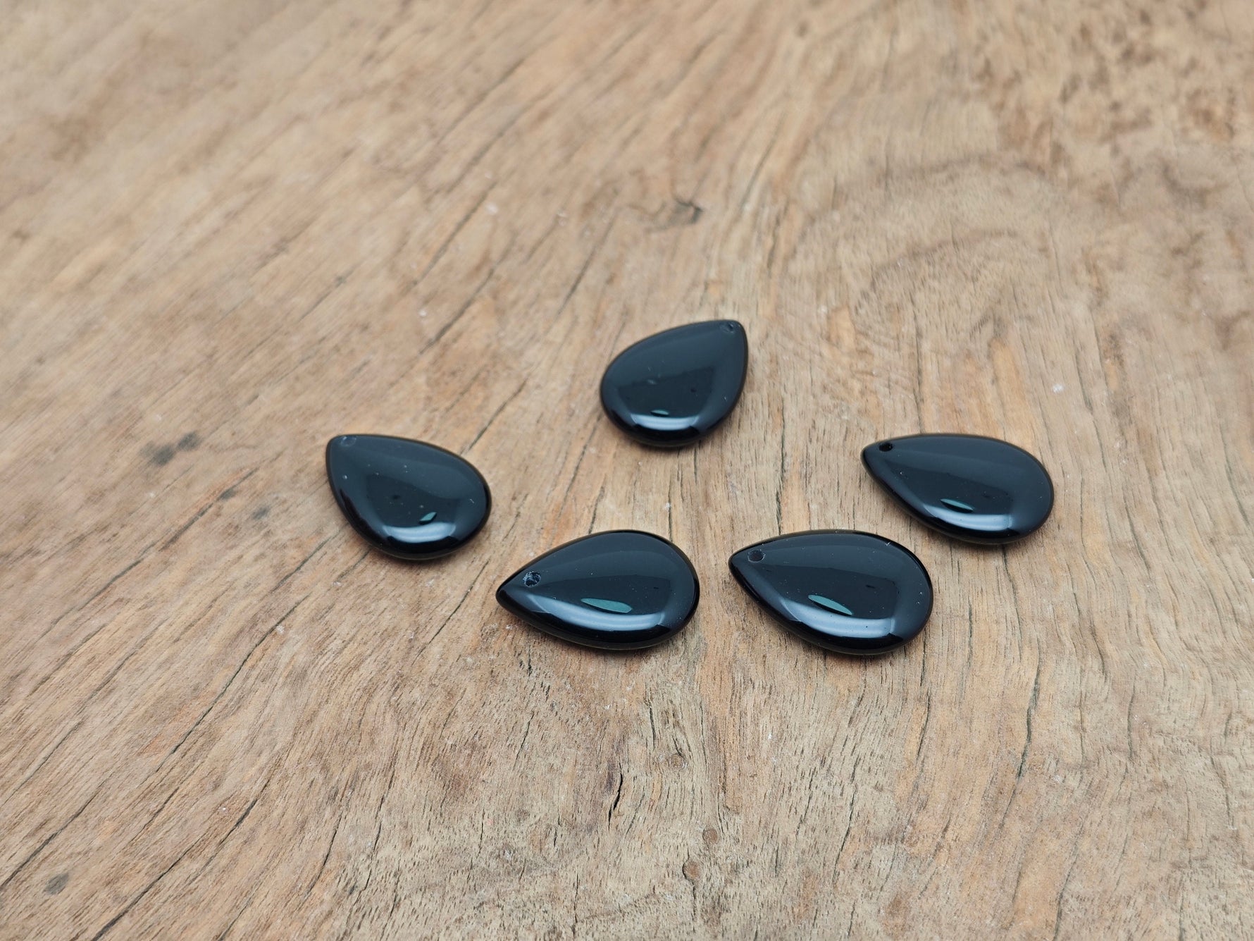 Dainty black obsidian crystal pendant with drop design, suitable for DIY jewelry making, from GemstoneGO.