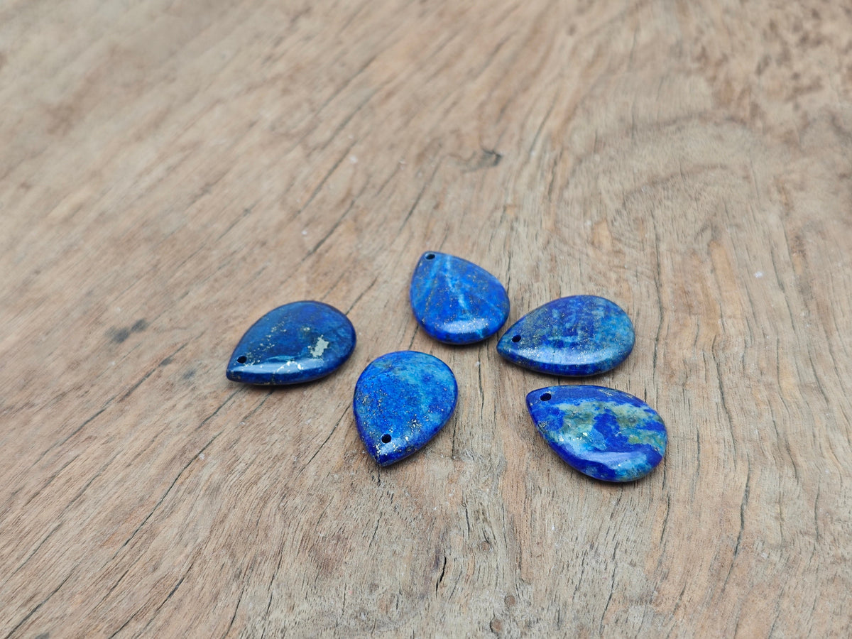 Lapis Lazuli dainty drop crystal pendant for DIY jewelry making, featuring a deep blue gemstone with gold-tone accents.