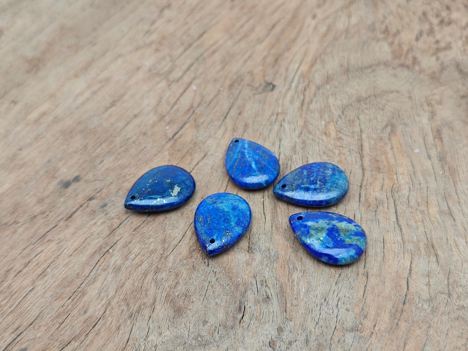 Lapis Lazuli dainty drop crystal pendant for DIY jewelry making, featuring a deep blue gemstone with gold-tone accents.
